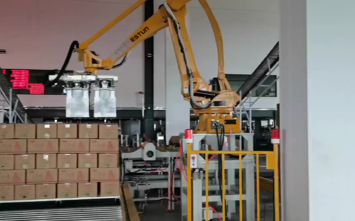 山东腾阳纸箱码垛机,纸箱搬运机械手,自动包装码垛线
