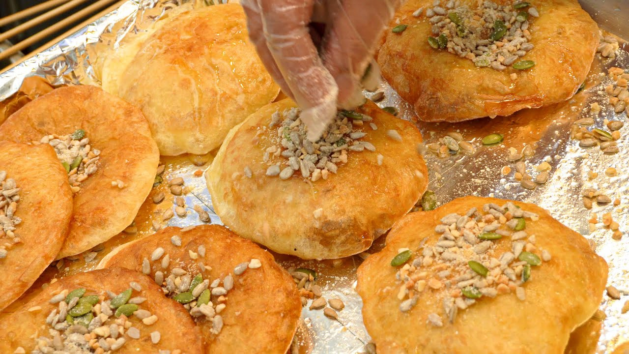 韩国人超爱吃的炸甜煎饼酥脆香口的1000韩元一个