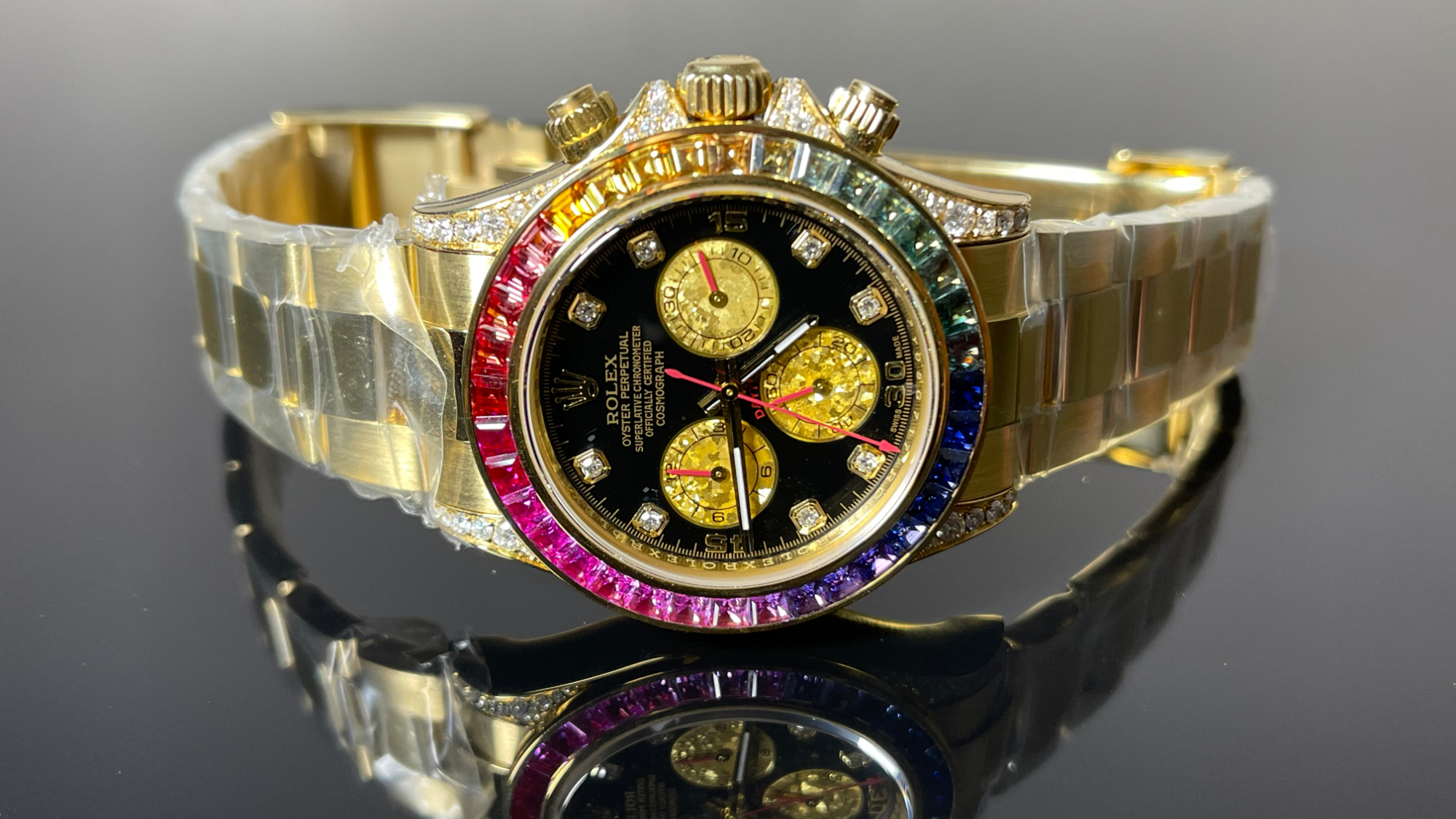 腕表后镶钻改装,劳力士黄金彩虹迪通拿